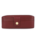 Compact jewelry case with snap button closure and removable tray.